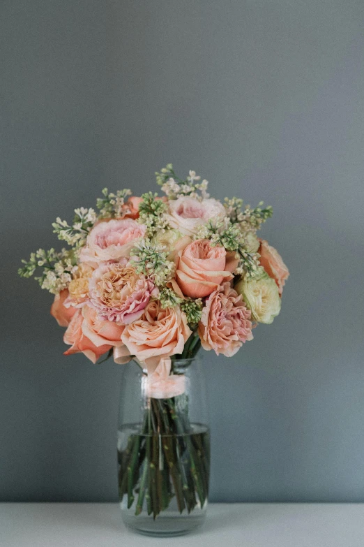 a vase filled with pink and white flowers, a pastel, inspired by François Boquet, unsplash, romanticism, (light orange mist), decorative roses, finely textured, sparkling