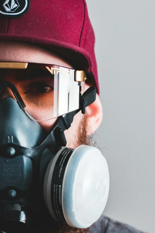 a man wearing a gas mask and goggles, by Ben Zoeller, pexels contest winner, hyperrealism, pyramid hoodvisor, carpenter, profile image, spray paint