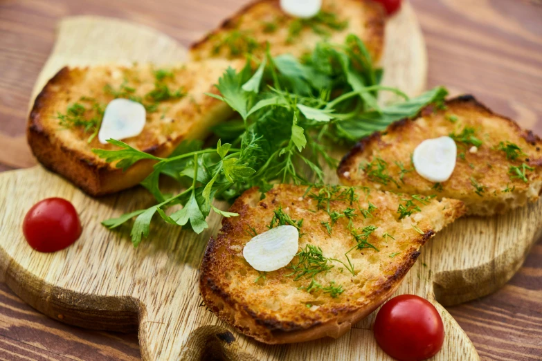 a wooden cutting board topped with slices of bread, renaissance, herbs, thumbnail, plated, battered