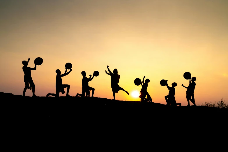 a group of people standing on top of a hill, lifting weights, sisyphus compostition, sun set, profile image