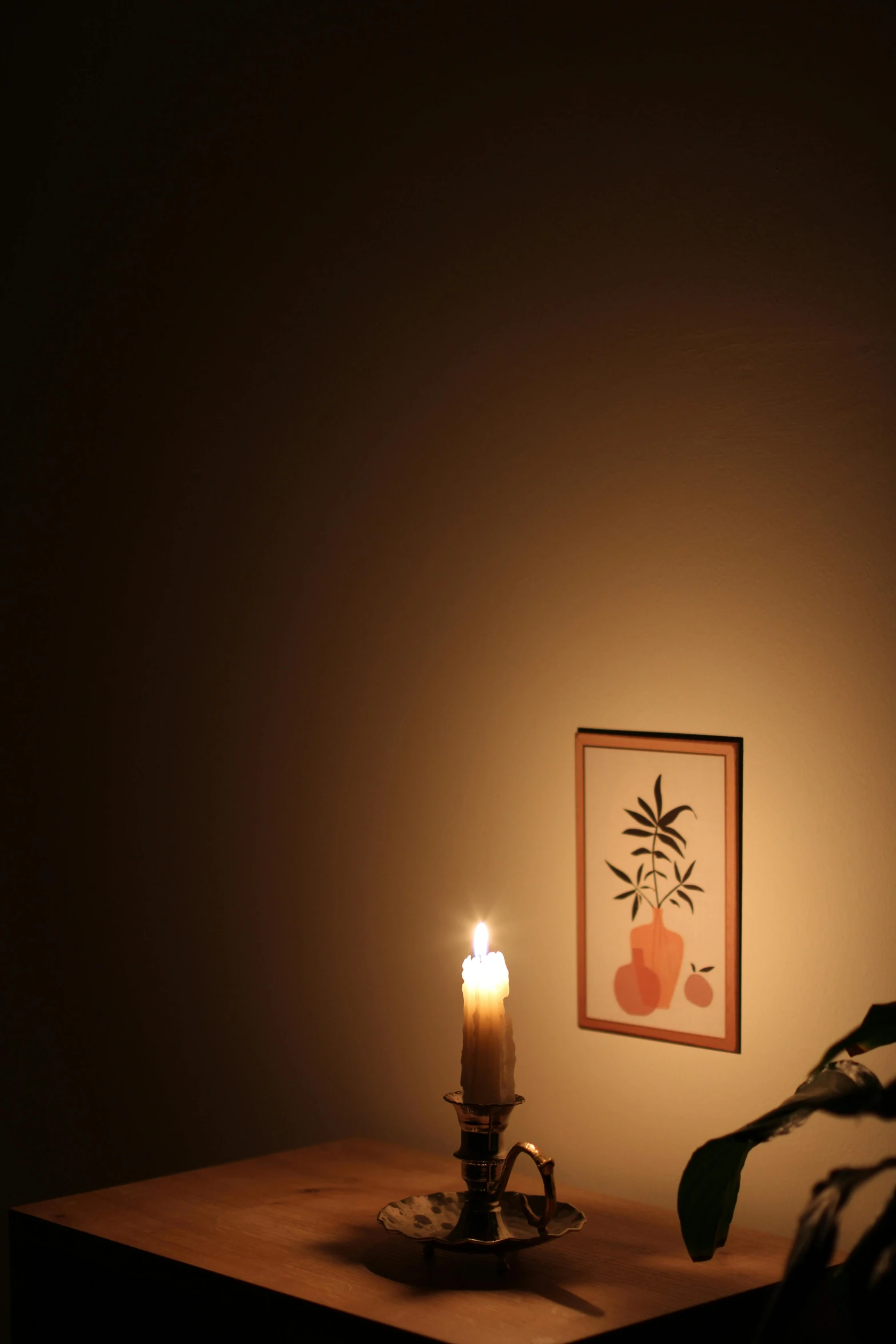 a lit candle sitting on top of a wooden table, a picture, inspired by Elsa Bleda, on the walls, low quality photograph, ad image, tropical lighting