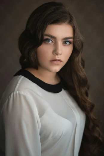 a woman with long hair wearing a white shirt, a character portrait, by irakli nadar, unsplash, a beautiful teen-aged girl, heavy brow, professional photo, indoor picture