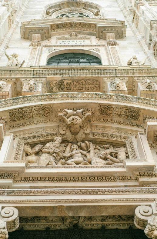 a very tall building with a clock on it's side, a marble sculpture, by Luca della Robbia, baroque, archs, details faces, an archway, intricate detailed roof