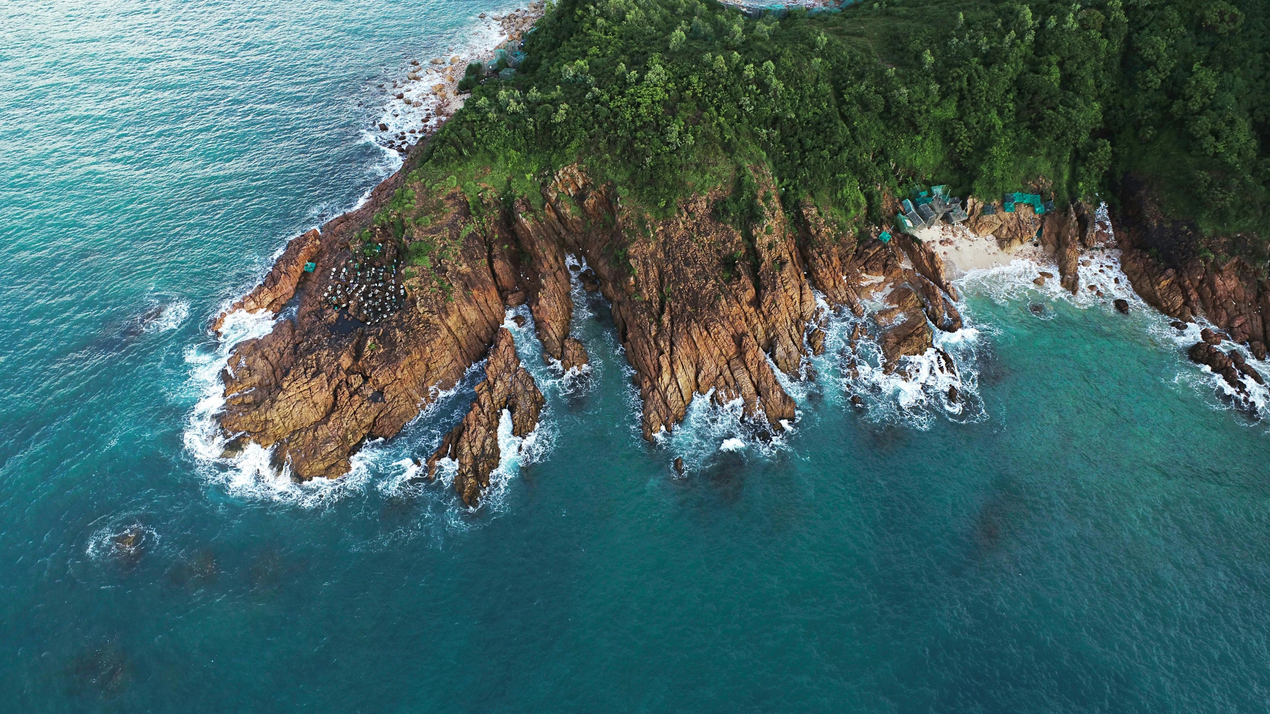 a small island in the middle of the ocean, a digital rendering, pexels contest winner, landslides, australian beach, jungle setting, jagged rocks