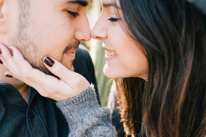 a man and a woman looking into each other's eyes, trending on pexels, closeup of an adorable, pokimane, realistic »