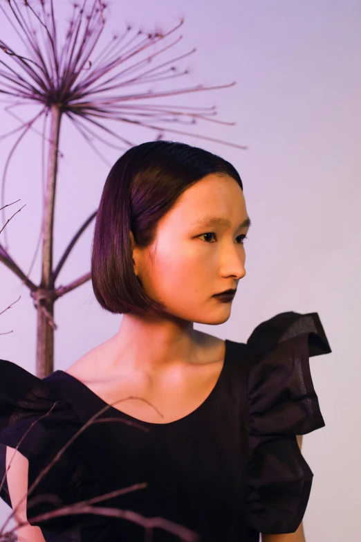 a woman in a black dress standing next to a tree, an album cover, inspired by Gao Xiang, conceptual art, head and shoulders view, porcelain japanese mannequins, loosely cropped, portrait n - 9