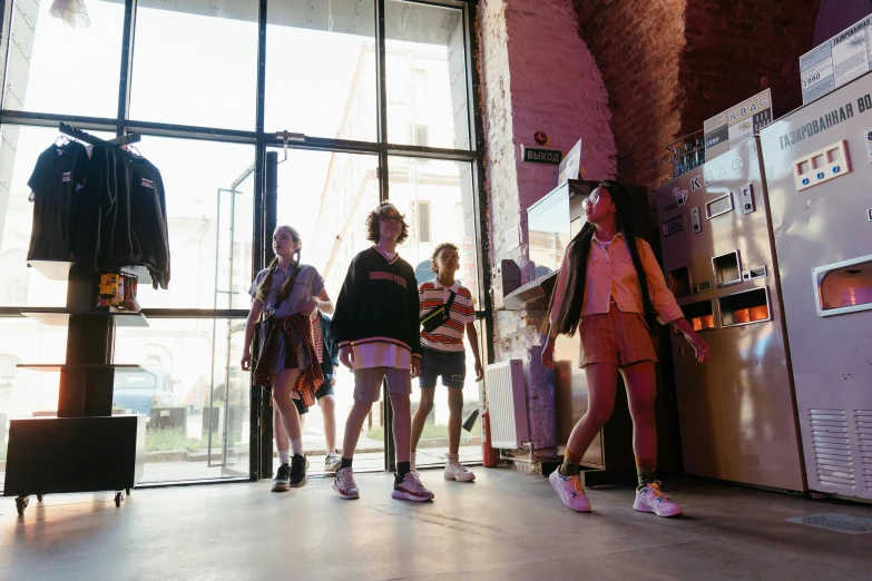a group of people standing in front of a refrigerator, teenager hangout spot, biennale, walking down, promotional image