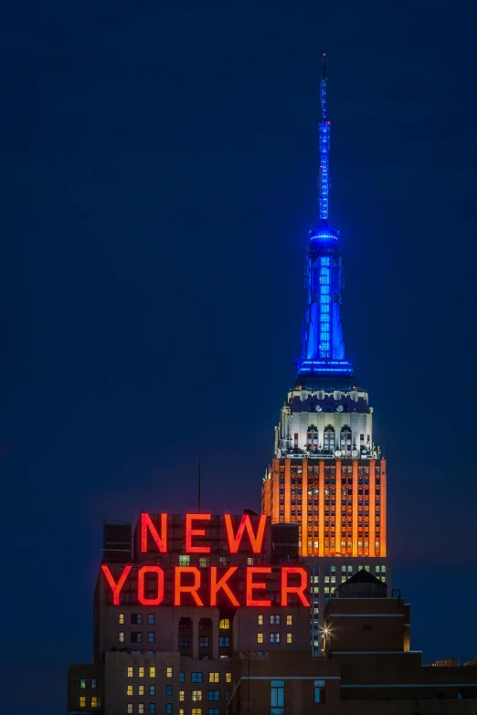 the empire state building lit up in red, white and blue, unsplash contest winner, art nouveau, orange neon, new yorker magazine cover, # nofilter, espn