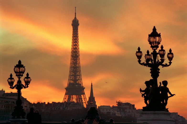 a view of the eiffel tower at sunset, pexels contest winner, art nouveau, square, brown, obelisk, petite