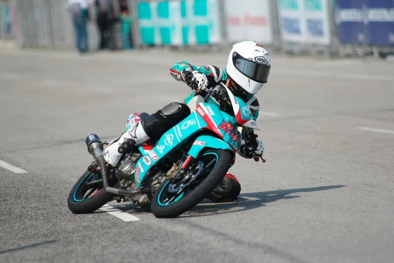 a person riding a motorcycle on a race track, pexels contest winner, shin hanga, teal uniform, square, street, teal silver red