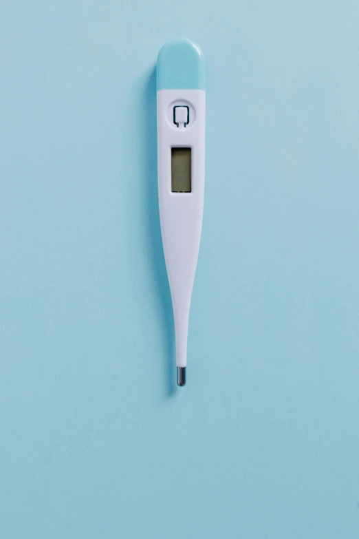 an electronic thermometer on a blue background, happening, fertility, thumbnail, 8, one