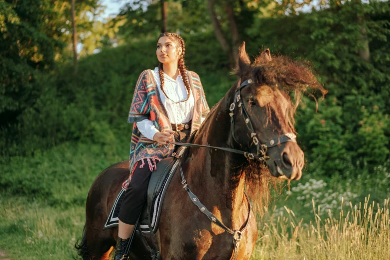 a woman riding on the back of a brown horse, by Emma Andijewska, pexels contest winner, renaissance, tribal clothing, avatar image, isabela moner, summer evening