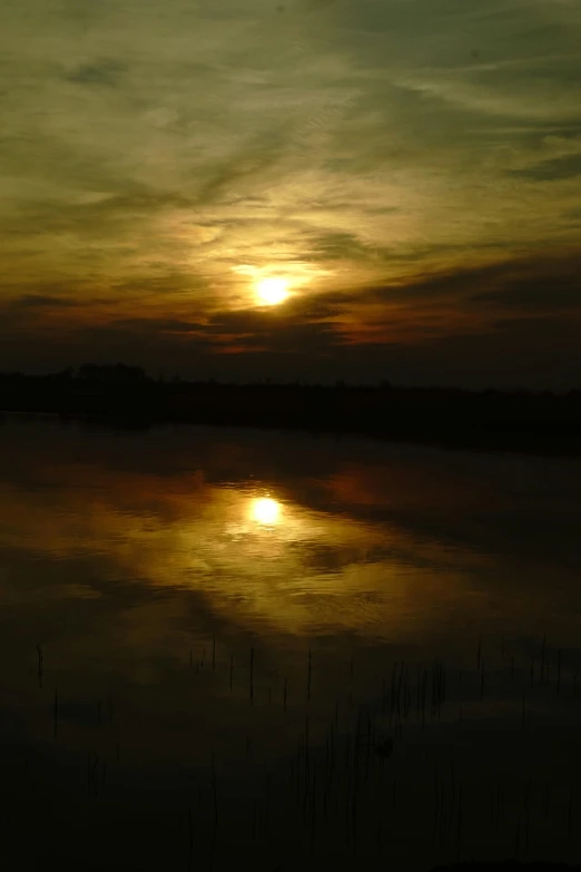 the sun is setting over a body of water, by Jan Tengnagel, land art, very poor quality of photography, god\'s creation, metalic reflection, night light