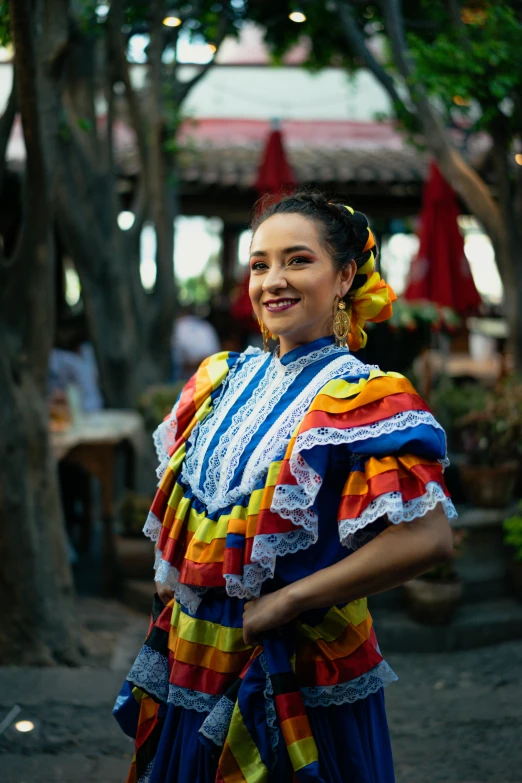 a woman in a colorful dress posing for a picture, inspired by Gina Pellón, happening, mexico, asian women, girl wearing uniform, bella poarch