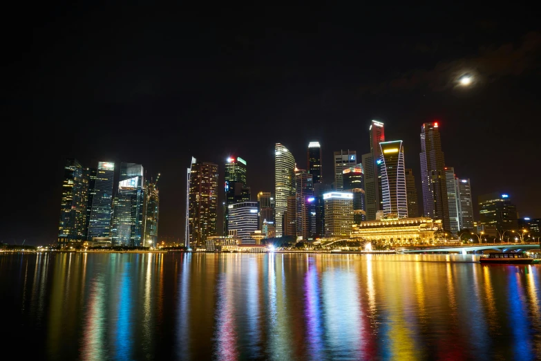 a city at night with a full moon in the sky, pexels contest winner, the singapore skyline, avatar image