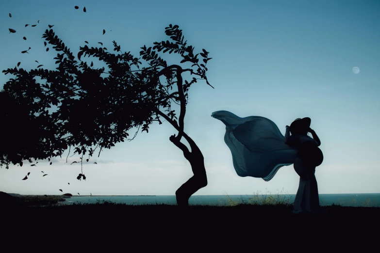 a woman in a white dress standing next to a tree, a statue, by Lucia Peka, pexels contest winner, couple dancing, silhouette :7, avatar image, big long cloth on the wind