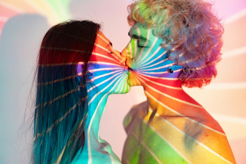 a man kissing a woman with a rainbow painted face, an airbrush painting, inspired by Gabriel Dawe, trending on pexels, bisexual lighting, an orgy of colorful, profile image, fluorescent