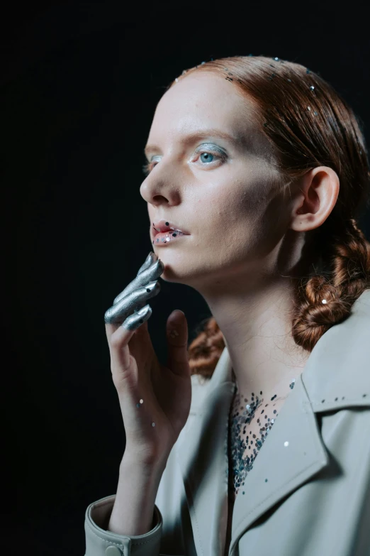 a woman holding a cell phone to her ear, an album cover, inspired by Romaine Brooks, unsplash, renaissance, jessica chastain, iridescent specular highlights, photographed for reuters, at a fashion shoot