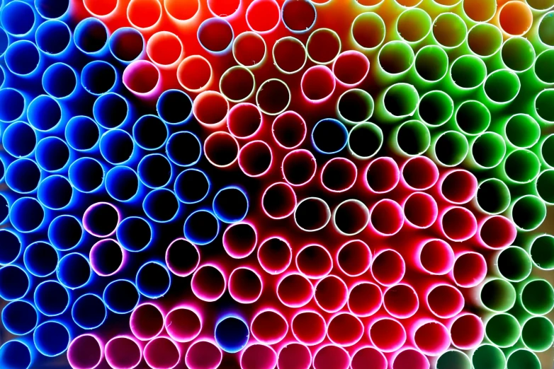 a bunch of colorful straws sitting on top of each other, a stipple, by Jan Rustem, deep vibrant colors, cane, straw, refreshing