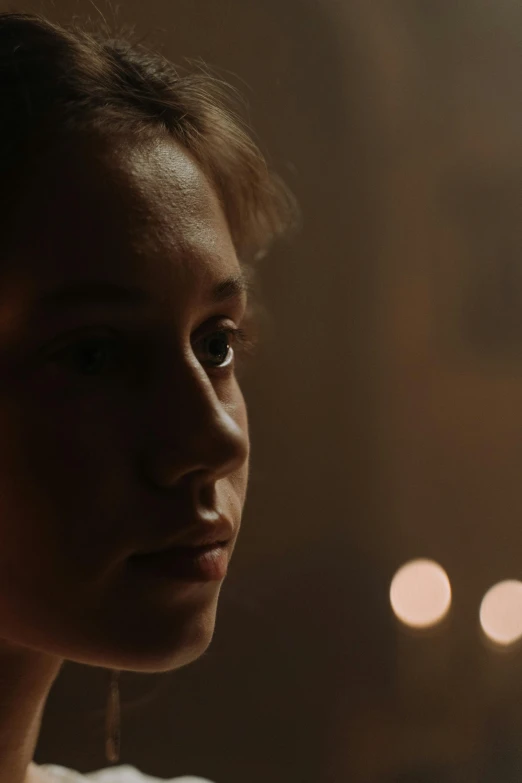 a close up of a person with a cell phone, a portrait, pexels contest winner, tonalism, movie still 8 k, alicia vikander, light from right, 2 0 2 1 cinematic 4 k framegrab