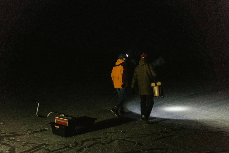 a couple of people that are standing in the dark, shooting ice, anato finnstark and kelogsloops, search lights, ash thorp