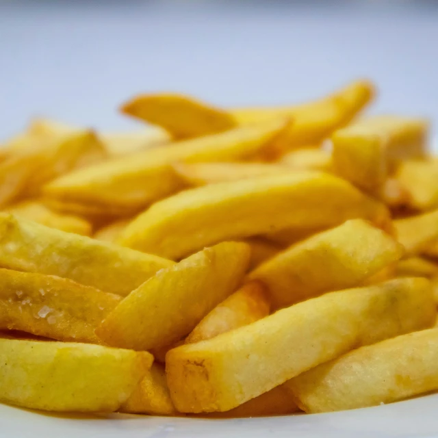 a plate of french fries on a table, 15081959 21121991 01012000 4k, costa blanca, portrait photo, high resolution