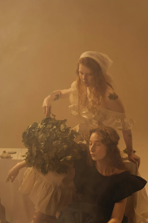 a couple of women sitting on top of a bed, an album cover, inspired by Anna Füssli, unsplash, renaissance, porcelain holly herndon statue, garbage, dusty light, still from a music video