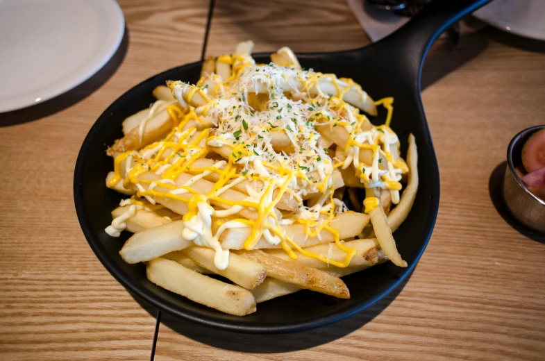 a close up of a plate of food on a table, inspired by Pia Fries, unsplash, hurufiyya, melted cheddar, southern cross, anime food, bowl filled with food