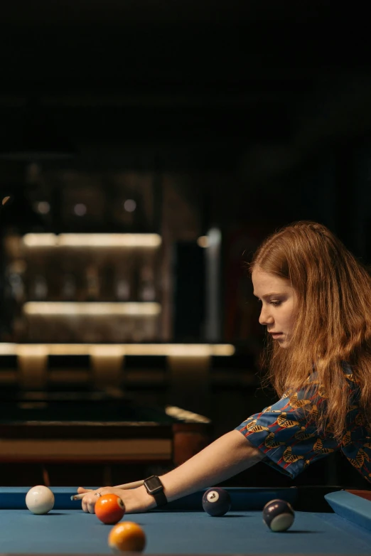 a woman is playing a game of pool, a portrait, inspired by Nan Goldin, unsplash, sitting at the bar, juno promotional image, miranda otto, playing piano