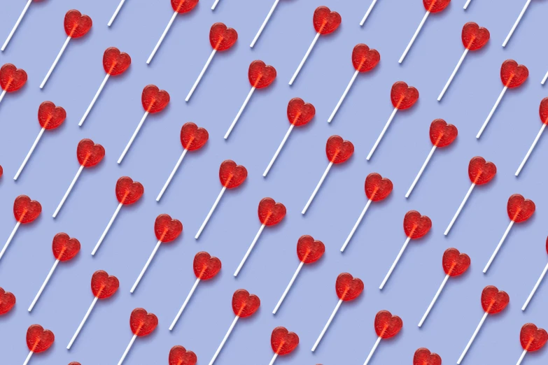 a lot of lollipops in the shape of hearts, by Pamela Drew, trending on pixabay, perfectly tileable, wrapped blue background, background image, spears