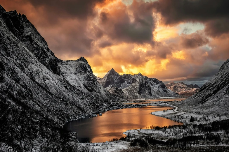 a large body of water surrounded by snow covered mountains, by Sebastian Spreng, pexels contest winner, romanticism, sunset in a valley, gray and orange colours, nordic crown, conde nast traveler photo