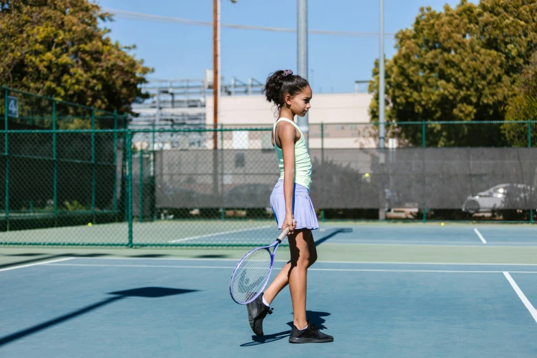 a young girl holding a tennis racquet on a tennis court, unsplash, happening, full body image, thumbnail, california;, profile pic