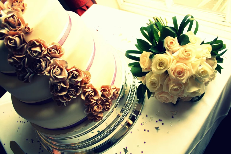 a wedding cake sitting on top of a table, by Lee Loughridge, bouquets, sepia toned, rosses, thumbnail