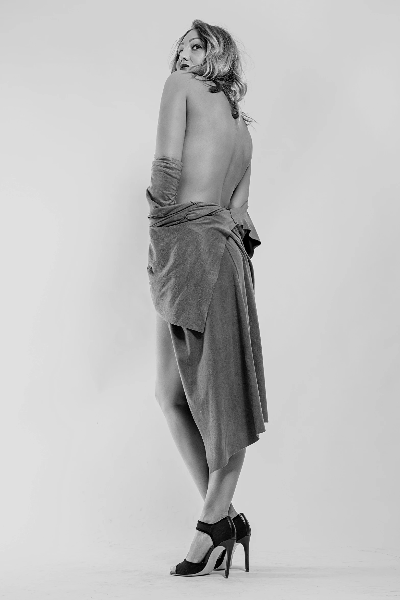 a black and white photo of a woman in a dress, by Clifford Ross, tumblr, figurative art, wearing a towel, rick owens, clay model, full body cgsociety