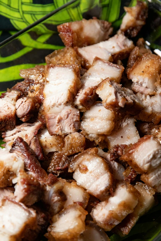 a close up of a plate of food on a table, pork, 6 pack, thumbnail, smoky