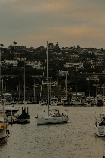 a number of boats in a body of water, by Simon Marmion, pexels contest winner, renaissance, southern california, late summer evening, panoramic, bored ape yacht club