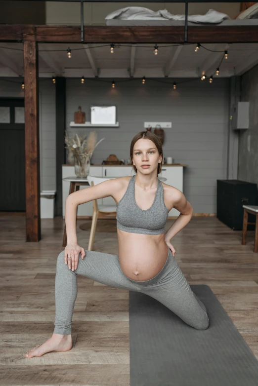 a pregnant woman is doing a yoga pose, by Matija Jama, pexels contest winner, photorealistic full body, gif, high quality picture, anna nikonova aka newmilky