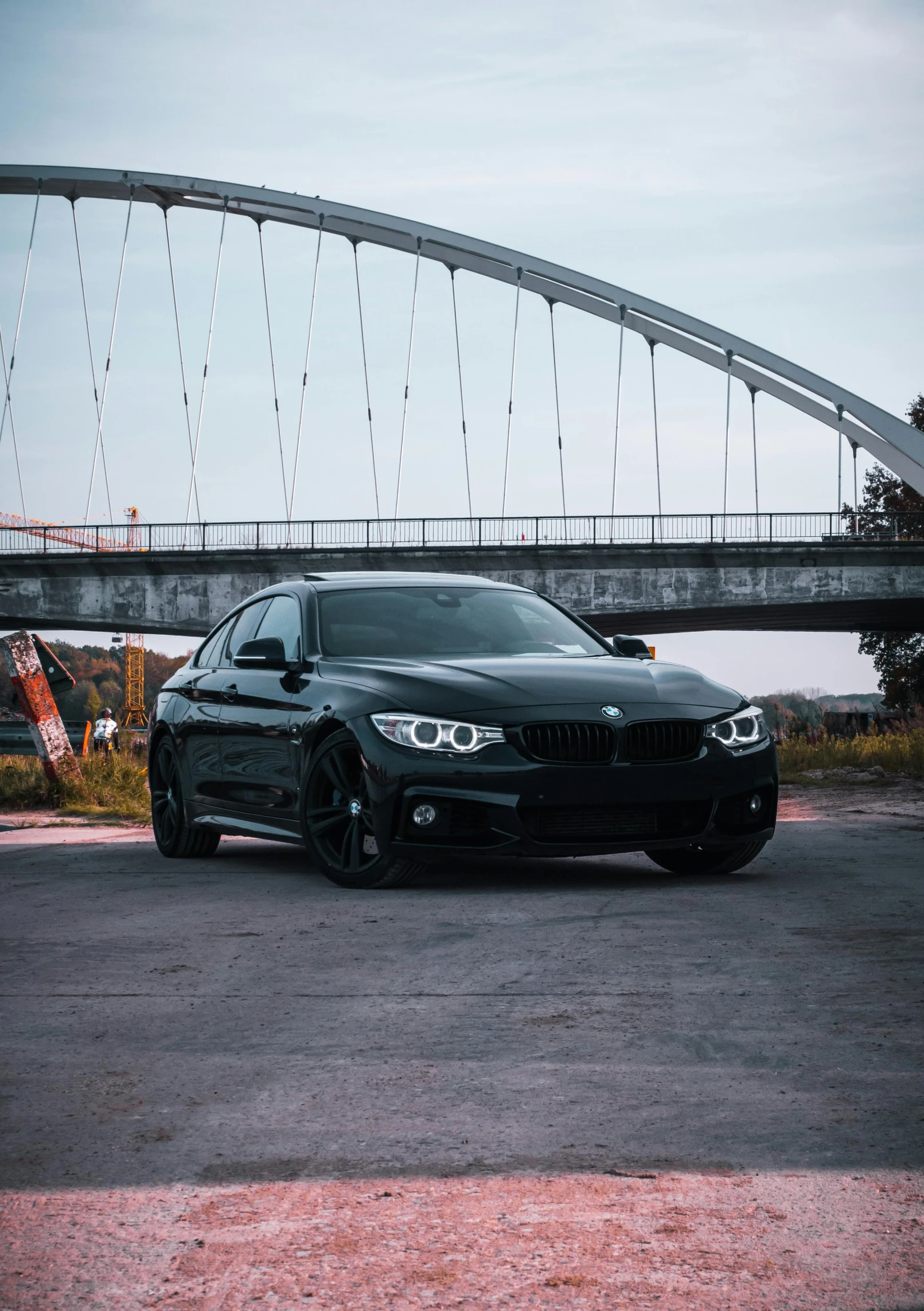 a black car parked in front of a bridge, profile image, bmw, f4.0, front shot