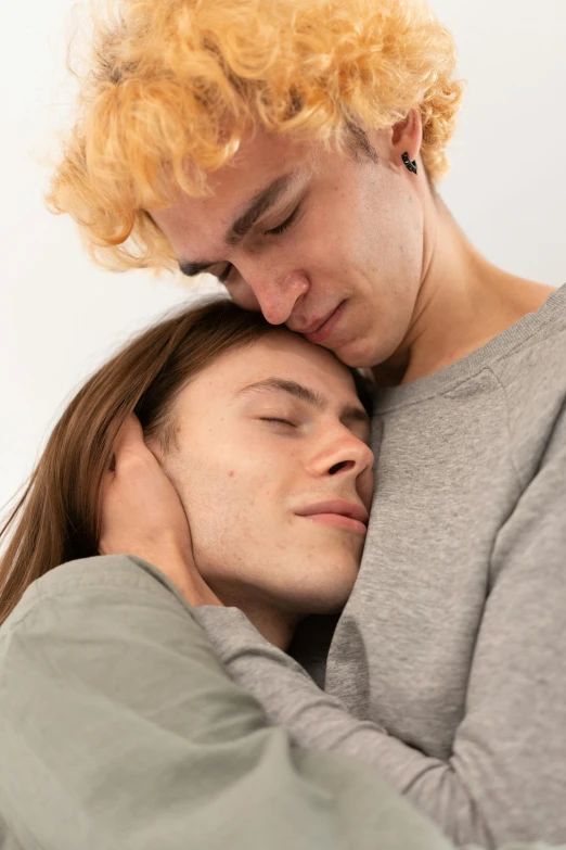 a man and a woman cuddling in bed, antipodeans, nonbinary model, profile image, teenage boy, two men hugging