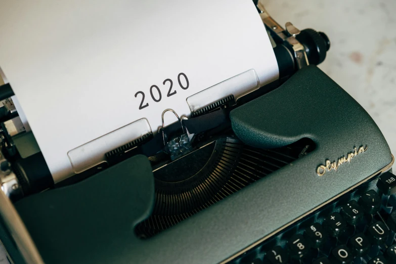a typewriter with a sheet of paper on top of it, trending on pexels, happening, year 2 0 4 0, near future 2 0 3 0, thumbnail, iso