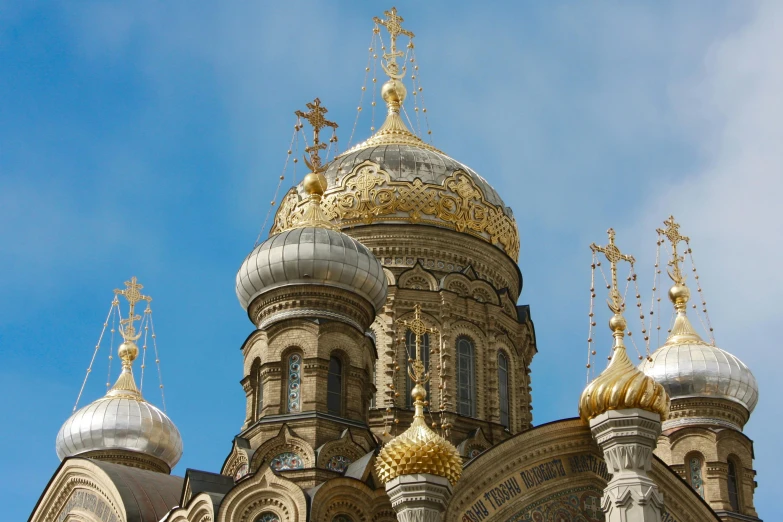 a church with golden domes against a blue sky, inspired by Nikolay Makovsky, trending on unsplash, square, with ornate jewelled, grey, wide screenshot