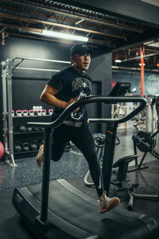 a man running on a treadie in a gym, by Robbie Trevino, happening, vsx, origin jumpworks, pete davidson, fit girl