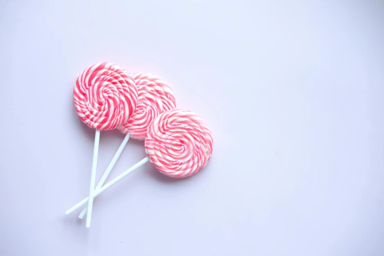 two pink lollipop lollipop lollipop lollipop lollipop lollipop lollipop lollipop lolli, pexels, red and white stripes, mint, minimalist photo, 15081959 21121991 01012000 4k