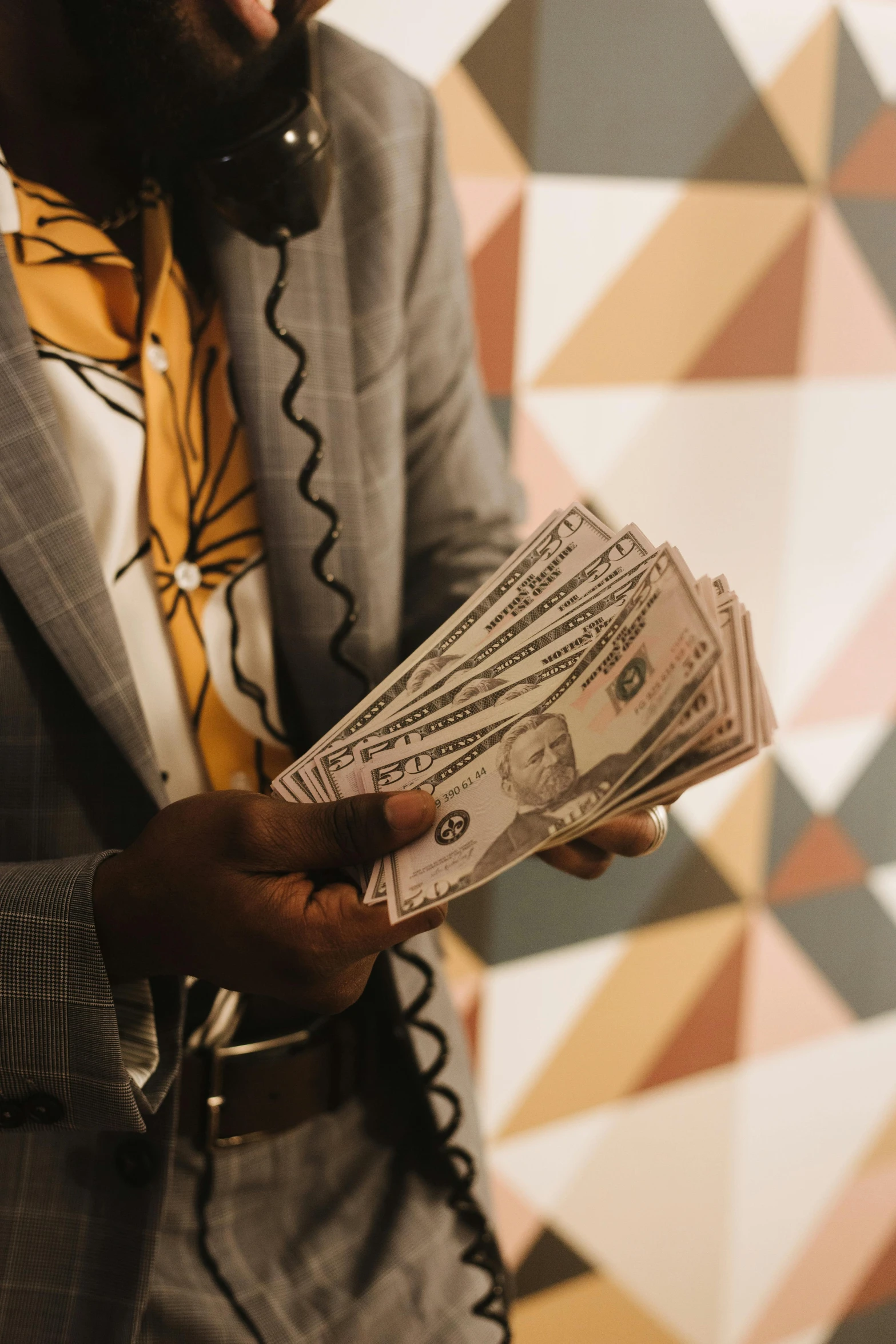 a man in a suit holding a bunch of money, by Matt Cavotta, pexels contest winner, renaissance, photo of a black woman, 256435456k film, multicolored, instagram picture