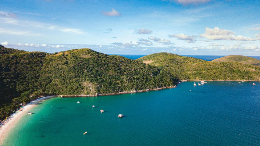 a large body of water next to a lush green hillside, a screenshot, pexels contest winner, treasure island, manly, two medium sized islands, listing image