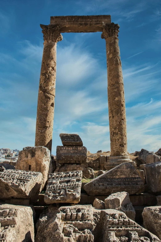 the ruins of the ancient city of delphi in turkey, by Jason Felix, pexels contest winner, neoclassicism, old town mardin, obelisks, blue sky, standing atop a pile of rubble