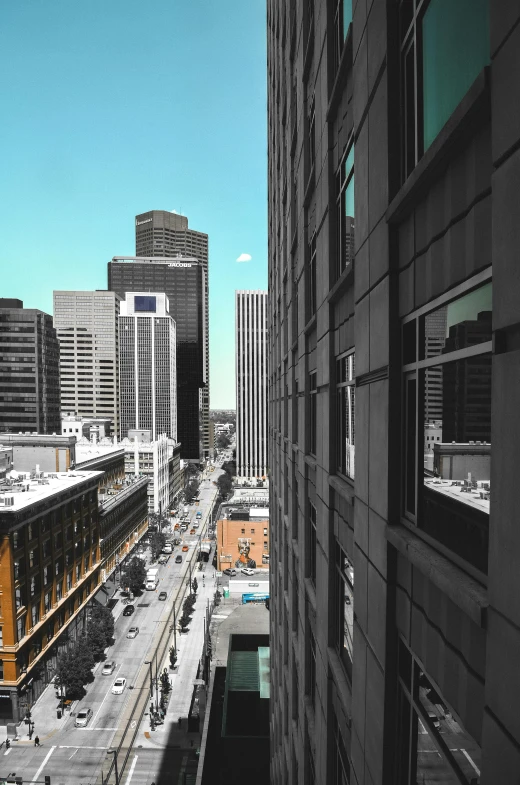 a view of a city from a high rise building, a colorized photo, pexels contest winner, photorealism, empty streetscapes, crisp lines, downtown, helmet view