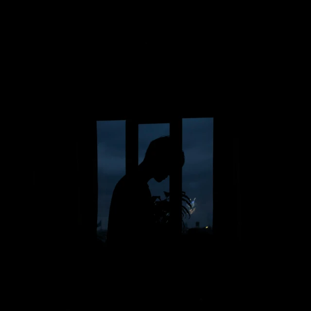 a silhouette of a person standing in front of a window, a picture, by Attila Meszlenyi, pexels contest winner, conceptual art, heartbroken, summer night, album cover, shot on sony a 7