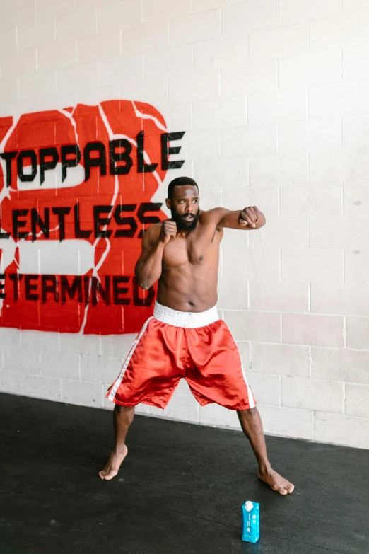 a man throwing a frisbee in a gym, an album cover, by Arabella Rankin, happening, kanye west torso, heroic muay thai stance pose, profile image, instagram photo