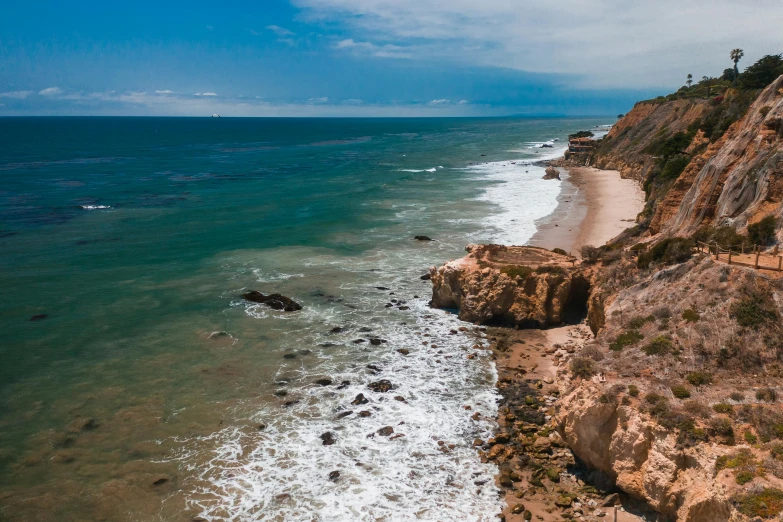 a view of the ocean from the top of a cliff, by Ryan Pancoast, pexels contest winner, malibu canyon, thumbnail, australian beach, background image